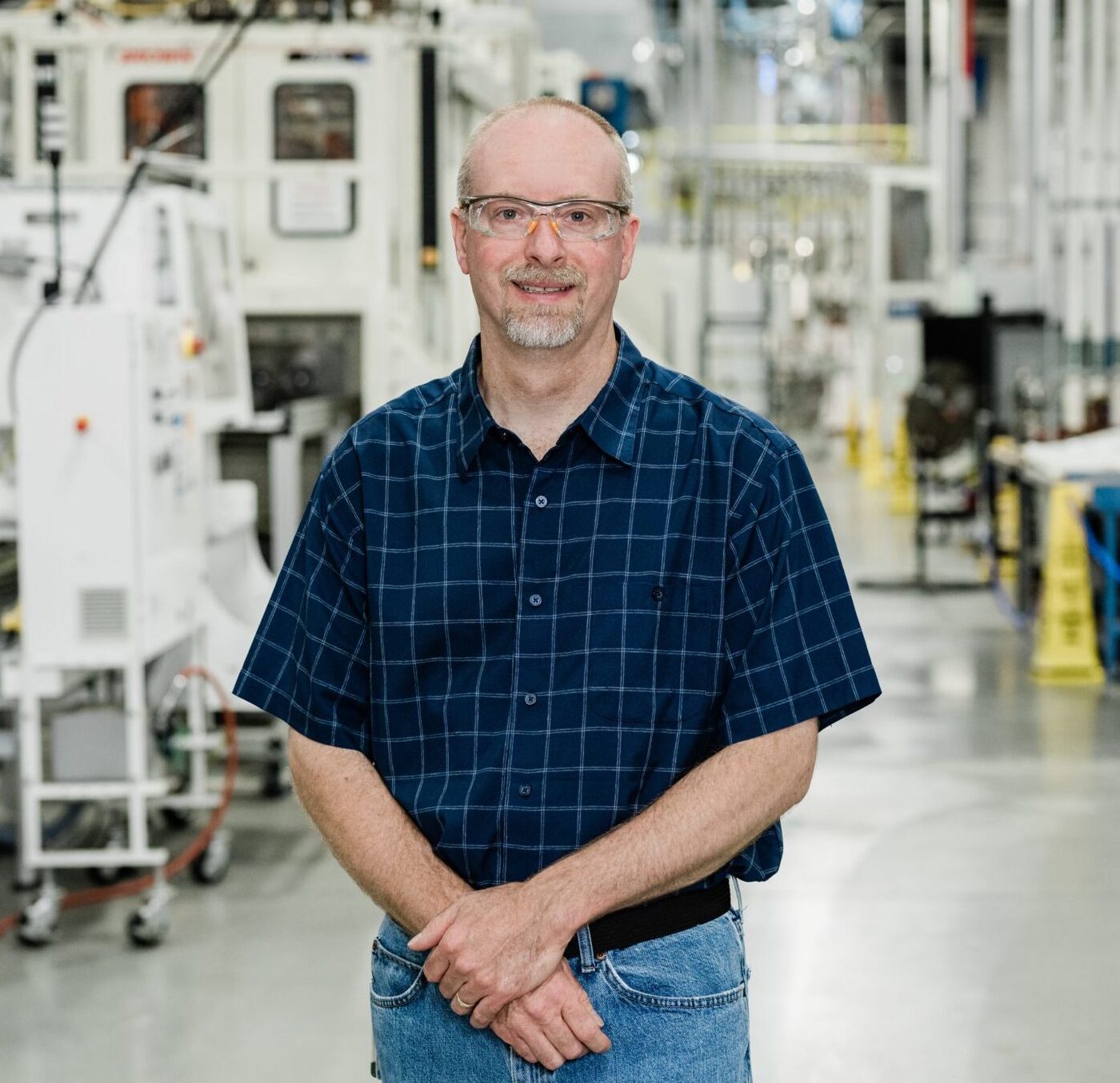 Person standing on production floor